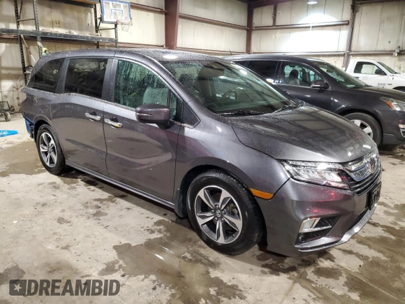 2020 Honda Odyssey Touring with VIN 5FNRL6H88LB009174, listed as a Copart auction lot 86636264 with 67,491 mi miles and Salvage Title. Bid and sale history available at DreamBid. Image 4.