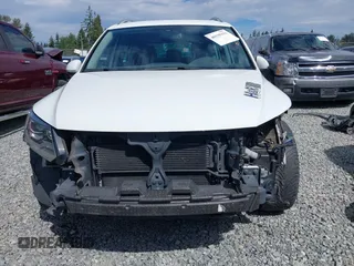 2016 Volkswagen Tiguan S with VIN WVGBV7AXXGW580052, listed as a IAAI auction lot 41444015 with 102,165 mi miles and . Bid and sale history available at DreamBid. Image 6.