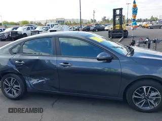2023 Kia Forte LXS z VIN 3KPF24AD6PE578103, wystawiony jako IAAI lot #42131745 z przebiegiem 42 003 mil mil oraz . Historia ofert i sprzedaży dostępna na DreamBid. Obrazek 13.