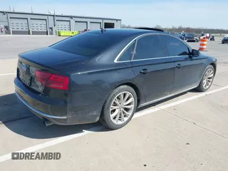 2011 Audi A8 with VIN WAUAVAFD5BN022388, listed as a IAAI auction lot 42102765 with 141,865 mi miles and . Bid and sale history available at DreamBid. Image 4.
