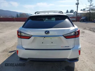 2016 Lexus RX 450h with VIN 2T2BGMCAXGC004844, listed as a IAAI auction lot 41791066 with 100,604 mi miles and . Bid and sale history available at DreamBid. Image 16.