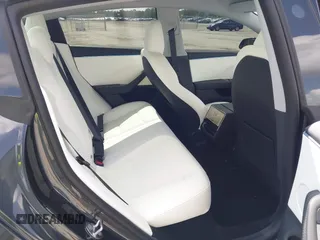 2025 Tesla Model 3 Long Range with VIN 5YJ3E1EA7SF940208, listed as a IAAI auction lot 42433793 with 1,983 mi miles and . Bid and sale history available at DreamBid. Image 8.