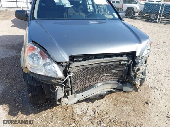 2006 Honda CR-V LX with VIN JHLRD68586C024863, listed as a IAAI auction lot 41569505 with 210,624 mi miles. Bid and sale history available at carsss.com. Image 6.