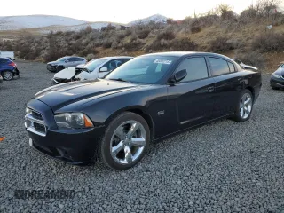 2013 Dodge Charger RT with VIN 2C3CDXCT0DH712059, listed as a Copart auction lot 46000715 with 87,903 mi miles and Salvage Title. Bid and sale history available at carsss.com. Image 1.