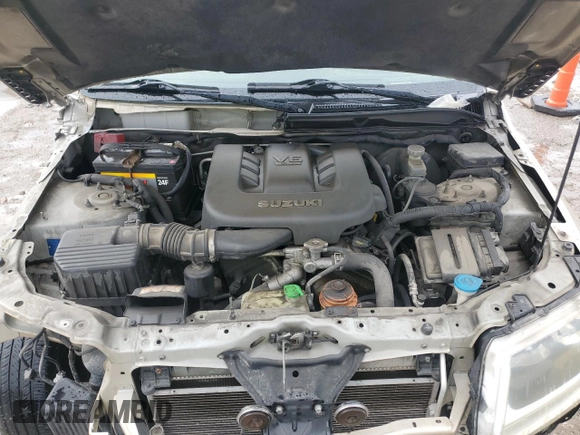 2007 Suzuki Grand Vitara XSport z VIN JS3TE944X74204616, wystawiony jako Copart lot #47350075 z przebiegiem 218 700 mil mil oraz Szkoda całkowita • Salvage title. Historia ofert i sprzedaży dostępna na DreamBid. Obrazek 12.