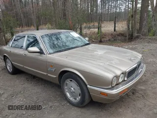 1997 Jaguar XJ with VIN SAJHX1245VC788530, listed as a IAAI auction lot 41768247 with 215,807 mi miles and . Bid and sale history available at DreamBid. Image 1.