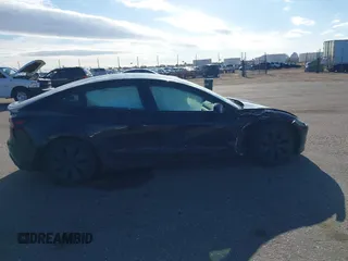 2025 Tesla Model 3 Long Range with VIN 5YJ3E1EB5SF877778, listed as a IAAI auction lot 41639595 with 8,295 mi miles and . Bid and sale history available at DreamBid. Image 12.