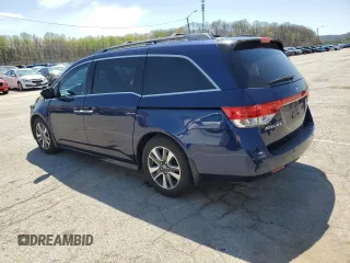 2014 Honda Odyssey Touring with VIN 5FNRL5H96EB068651, listed as a Copart auction lot 51649735 with 157,213 mi miles and Salvage title. Bid and sale history available at DreamBid. Image 2.
