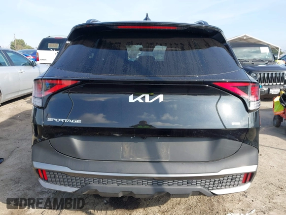 2023 Kia Sportage Plug-In Hybrid X-Line with VIN KNDPYDAH9P7027170, listed as a IAAI auction lot 41583963 with 15,276 mi miles. Bid and sale history available at carsss.com. Image 17.
