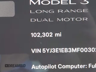 2021 Tesla Model 3 Long Range with VIN 5YJ3E1EB3MF003027, listed as a IAAI auction lot 41859036 with 102,302 mi miles and . Bid and sale history available at carsss.com. Image 16.