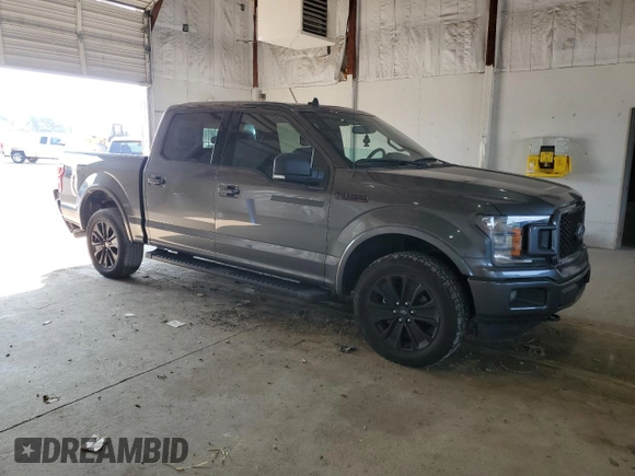 2020 Ford F-150 XL with VIN 1FTEW1E44LFC02735, listed as a Copart auction lot 62062125 with 111,471 mi miles and Salvage title. Bid and sale history available at DreamBid. Image 4.