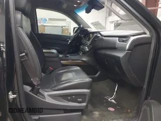 2015 Chevrolet Tahoe LT z VIN 1GNSCBKC1FR228488, wystawiony jako IAAI lot #41933869 z przebiegiem 164 523 mil mil oraz . Historia ofert i sprzedaży dostępna na DreamBid. Obrazek 5.