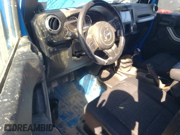 2011 Jeep Wrangler Rubicon with VIN 1J4BA6D15BL563410, listed as a Copart auction lot 76973964 with 68,334 mi miles and Salvage title. Bid and sale history available at DreamBid. Image 8.