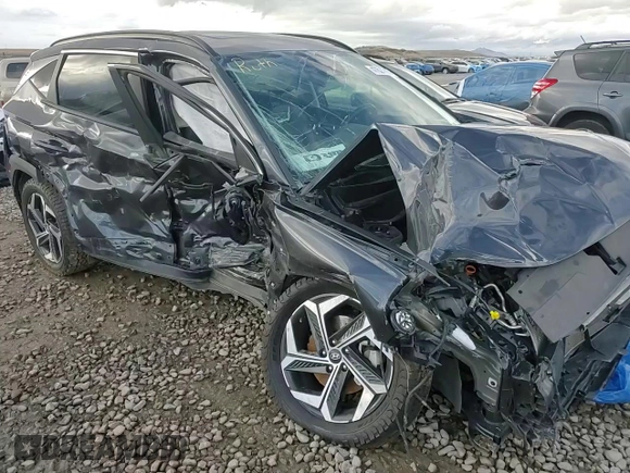 2022 Hyundai Tucson SEL with VIN 5NMJCCAE2NH118999, listed as a Copart auction lot 47620705 with 34,237 mi miles and Salvage Title. Bid and sale history available at DreamBid. Image 11.