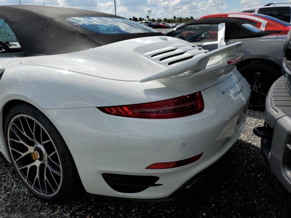 2015 Porsche 911 Turbo S with VIN WP0CD2A90FS172066, listed as a Copart auction lot 74954484 with 0 mi miles and Salvage Title. Bid and sale history available at carsss.com. Image 6.