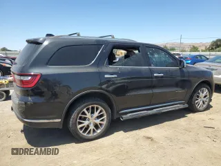 2014 Dodge Durango Citadel with VIN 1C4RDJEG5EC394396, listed as a Copart auction lot 61416305 with 185,730 mi miles and Salvage title. Bid and sale history available at DreamBid. Image 3.