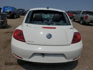 2013 Volkswagen Beetle with VIN 3VWHX7AT2DM656457, listed as a Copart auction lot 63814944 with 92,966 mi miles and Salvage Title. Bid and sale history available at DreamBid. Image 6.