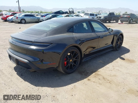 2022 Porsche Taycan GTS z VIN WP0AD2Y12NSA59275, wystawiony jako IAAI lot #42170547 z przebiegiem 43 757 mil mil oraz . Historia ofert i sprzedaży dostępna na DreamBid. Obrazek 4.