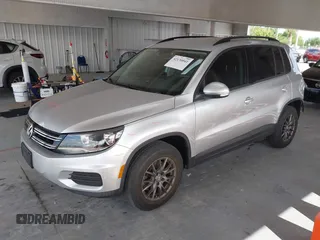 2016 Volkswagen Tiguan S with VIN WVGBV7AX2GW535784, listed as a IAAI auction lot 42130041 with 35,718 mi miles and . Bid and sale history available at DreamBid. Image 2.