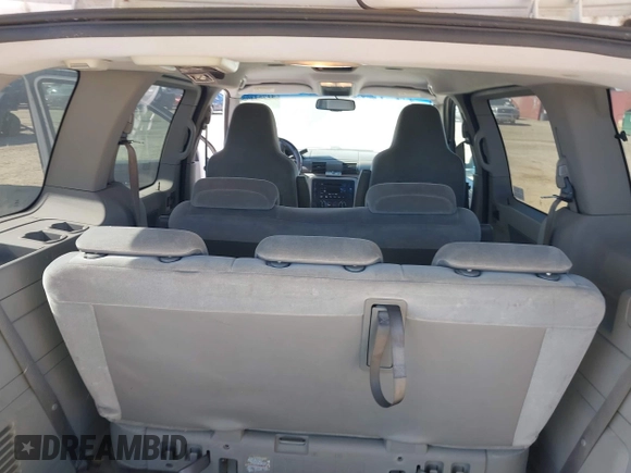 2006 Ford Freestar SE z VIN 2FMDA51656BA22707, wystawiony jako IAAI lot #41754405 z przebiegiem Nie podano mil oraz . Historia ofert i sprzedaży dostępna na DreamBid. Obrazek 8.