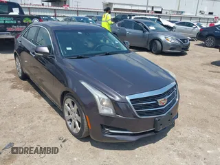 2015 Cadillac ATS Sedan Luxury RWD with VIN 1G6AB5RAXF0128099, listed as a IAAI auction lot 42133919 with 152,191 mi miles. Bid and sale history available at carsss.com. Image 1.