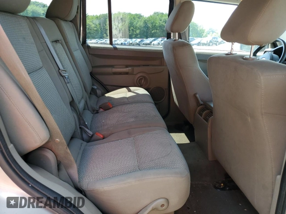 2007 Jeep Commander Sport z VIN 1J8HG48K67C651209, wystawiony jako Copart lot #64049035 z przebiegiem 216 628 mil mil oraz Szkoda całkowita • Salvage title. Historia ofert i sprzedaży dostępna na DreamBid. Obrazek 11.