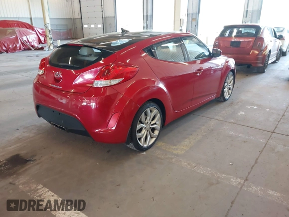 2012 Hyundai Veloster w/Gray Int z VIN KMHTC6AD3CU023998, wystawiony jako IAAI lot #42186875 z przebiegiem 170 771 mil mil oraz . Historia ofert i sprzedaży dostępna na DreamBid. Obrazek 4.