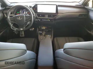 2023 Lexus UX 250h F Sport с VIN JTHR6JBH2P2150820, выставлен на аукционе Copart как лот 77956114 с пробегом 9 422 миль миль и Списание • Salvage title. История ставок и продаж доступна на DreamBid. Изображение 8.