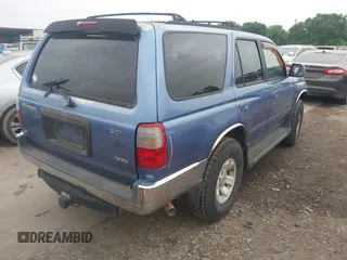 1999 Toyota 4Runner SR5 with VIN JT3GN86R1X0097244, listed as a IAAI auction lot 41948315 with 128,531 mi miles and . Bid and sale history available at DreamBid. Image 4.