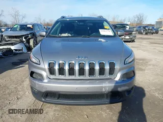 2014 Jeep Cherokee Latitude with VIN 1C4PJMCSXEW125737, listed as a IAAI auction lot 41863778 with 120,226 mi miles. Bid and sale history available at carsss.com. Image 12.