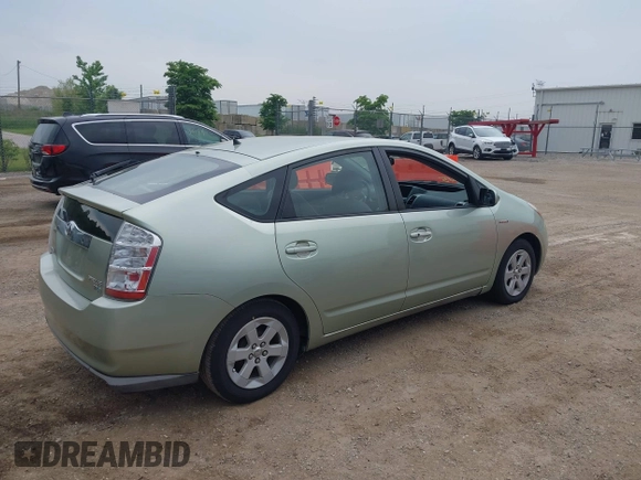 2007 Toyota Prius z VIN JTDKB20U673287354, wystawiony jako IAAI lot #42510185 z przebiegiem 253 448 mil mil oraz . Historia ofert i sprzedaży dostępna na DreamBid. Obrazek 4.