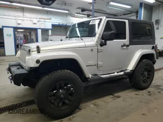 2010 Jeep Wrangler Sahara z VIN 1J4GA5D17AL109979, wystawiony jako Copart lot #45081225 z przebiegiem 190 826 mil mil oraz Szkoda całkowita • Salvage title. Historia ofert i sprzedaży dostępna na DreamBid. Obrazek 1.