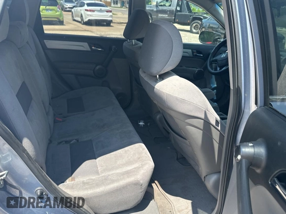 2011 Honda CR-V SE z VIN JHLRE4H46BC023276, wystawiony jako Copart lot #59952085 z przebiegiem 225 764 mil mil oraz Czysty tytuł • Clean title. Historia ofert i sprzedaży dostępna na DreamBid. Obrazek 6.
