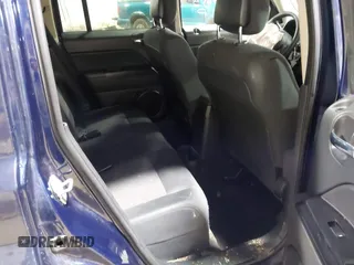 2014 Jeep Patriot Sport with VIN 1C4NJPBA1ED553340, listed as a IAAI auction lot 41212383 with 119,819 mi miles and . Bid and sale history available at DreamBid. Image 8.