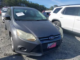 2014 Ford Focus SE with VIN 1FADP3F2XEL315908, listed as a IAAI auction lot 41843004 with 114,203 mi miles. Bid and sale history available at carsss.com. Image 6.
