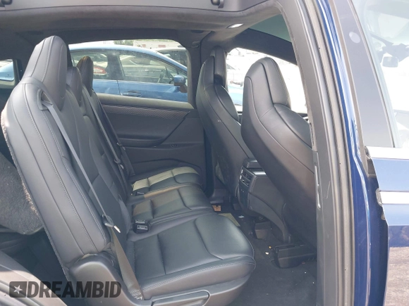 2018 Tesla Model X 75D with VIN 5YJXCAE21JF132628, listed as a IAAI auction lot 42081282 with 35,360 mi miles and . Bid and sale history available at carsss.com. Image 8.