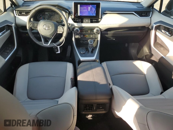 2024 Toyota RAV4 Hybrid XLE Premium z VIN 2T3B6RFV0RW074218, wystawiony jako Copart lot #56917295 z przebiegiem 14 969 mil mil oraz Szkoda całkowita • Salvage title. Historia ofert i sprzedaży dostępna na DreamBid. Obrazek 8.