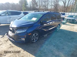 2020 Honda Odyssey Touring with VIN 5FNRL6H89LB015744, listed as a IAAI auction lot 41495735 with 106,440 mi miles and . Bid and sale history available at DreamBid. Image 2.