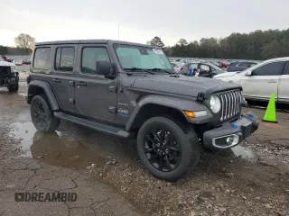2021 Jeep Wrangler Unlimited Sahara with VIN 1C4JJXP6XMW643026, listed as a Copart auction lot 49960415 with 43,733 mi miles and Salvage Title. Bid and sale history available at DreamBid. Image 4.