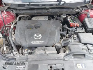 2016 Mazda CX-5 Sport with VIN JM3KE2BYXG0668401, listed as a IAAI auction lot 42370910 with Not provided miles and . Bid and sale history available at DreamBid. Image 10.