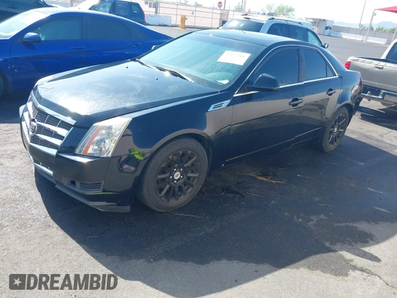 2008 Cadillac CTS RWD z VIN 1G6DF577180143506, wystawiony jako IAAI lot #42422201 z przebiegiem 157 003 mil mil oraz . Historia ofert i sprzedaży dostępna na DreamBid. Obrazek 2.
