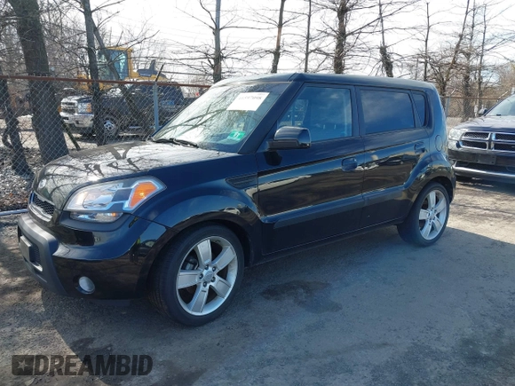 2010 Kia Soul + with VIN KNDJT2A22A7114453, listed as a IAAI auction lot 41597098 with 129,575 mi miles. Bid and sale history available at carsss.com. Image 2.