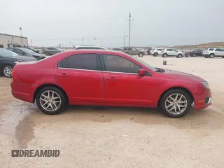 2012 Ford Fusion SEL z VIN 3FAHP0JG2CR165360, wystawiony jako IAAI lot #42064448 z przebiegiem 199 500 mil mil oraz . Historia ofert i sprzedaży dostępna na DreamBid. Obrazek 13.