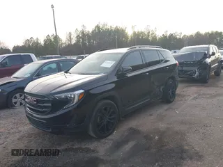 2021 GMC Terrain SLE with VIN 3GKALMEV5ML322850, listed as a IAAI auction lot 41297893 with 122,083 mi miles and . Bid and sale history available at carsss.com. Image 2.