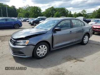 2015 Volkswagen Jetta S with VIN 3VW2K7AJ5FM327788, listed as a Copart auction lot 64034985 with 43,172 mi miles and Salvage title. Bid and sale history available at DreamBid. Image 1.