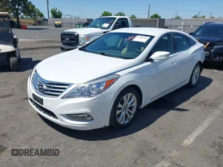 2013 Hyundai Azera with VIN KMHFG4JG5DA267347, listed as a IAAI auction lot 42580501 with 111,975 mi miles and . Bid and sale history available at DreamBid. Image 2.