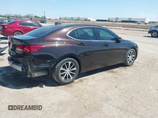 2015 Acura TLX z VIN 19UUB1F31FA018109, wystawiony jako IAAI lot #42045022 z przebiegiem 50 830 mil mil oraz . Historia ofert i sprzedaży dostępna na DreamBid. Obrazek 4.