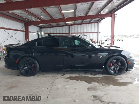 2019 Dodge Charger SRT Hellcat with VIN 2C3CDXL97KH552439, listed as a IAAI auction lot 41813879 with 58,921 mi miles and . Bid and sale history available at DreamBid. Image 13.