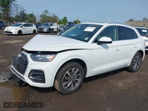 2021 Audi Q5 Premium Plus z VIN WA1BAAFYXM2050028, wystawiony jako IAAI lot #42479898 z przebiegiem 39 015 mil mil oraz . Historia ofert i sprzedaży dostępna na DreamBid. Obrazek 17.