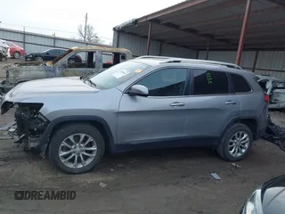 2019 Jeep Cherokee Latitude with VIN 1C4PJLCBXKD247676, listed as a IAAI auction lot 41598599 with 149,815 mi miles. Bid and sale history available at carsss.com. Image 15.